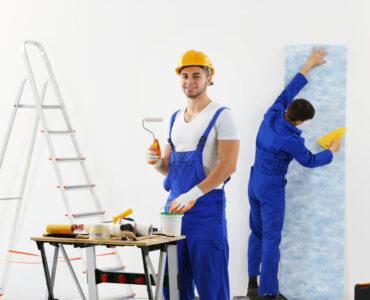 Workers,Renewing,Apartment,On,Wall,Background